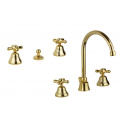 Three-hole tap set in gold...